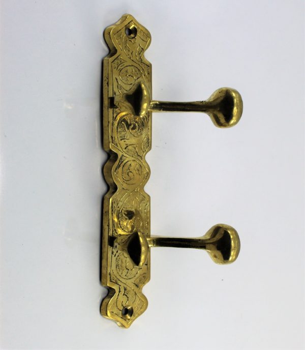 Coat hook for wall or door made of unlacquered brass