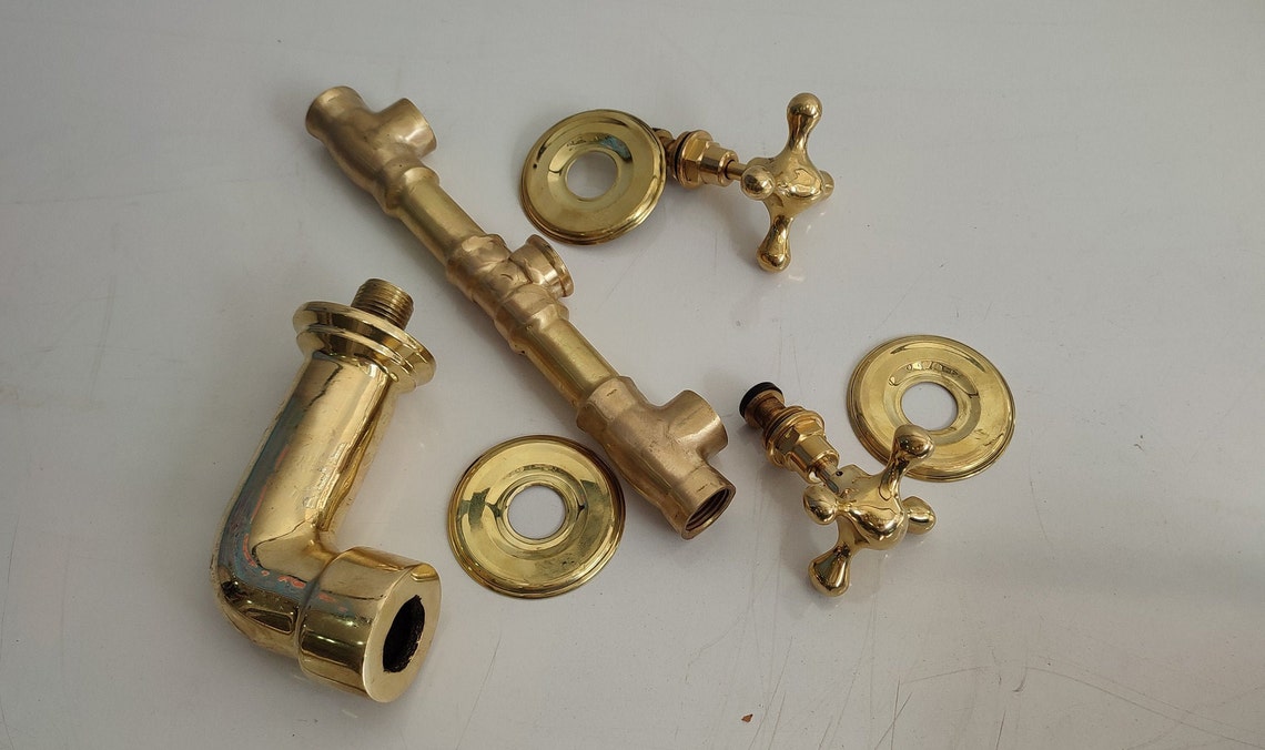 Brass vintage wall mounted bathroom faucet with gold finish
