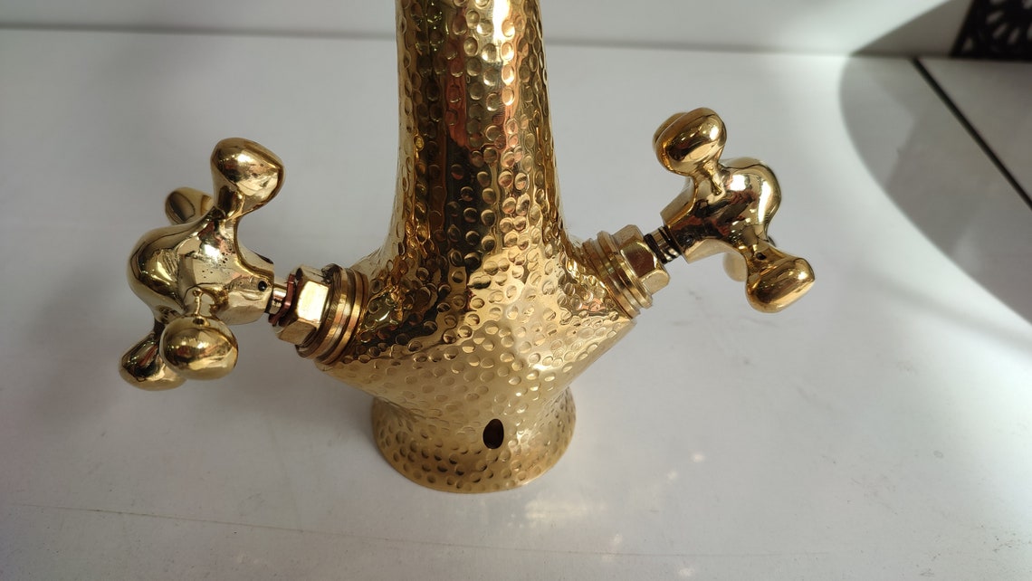 Bathroom sink faucet mixer tap with hammered gold finish